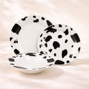 Service de table 36 pièces en porcelaine Vache