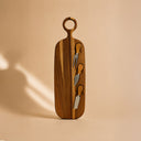 Planche à découper en bois d'acacia 49x16cm avec 3 couteaux